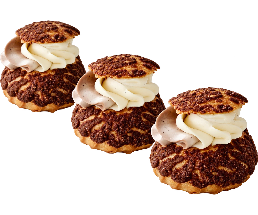 Three Choux pastries in a diagonal row